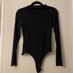 Black Akira mesh bodysuit
